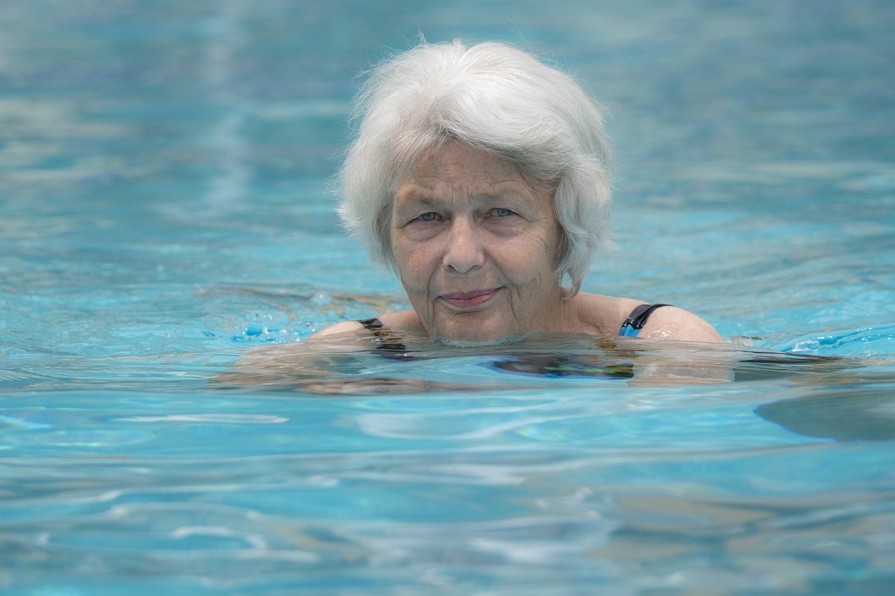 elderly woman swimming for rehab in Cary, NC