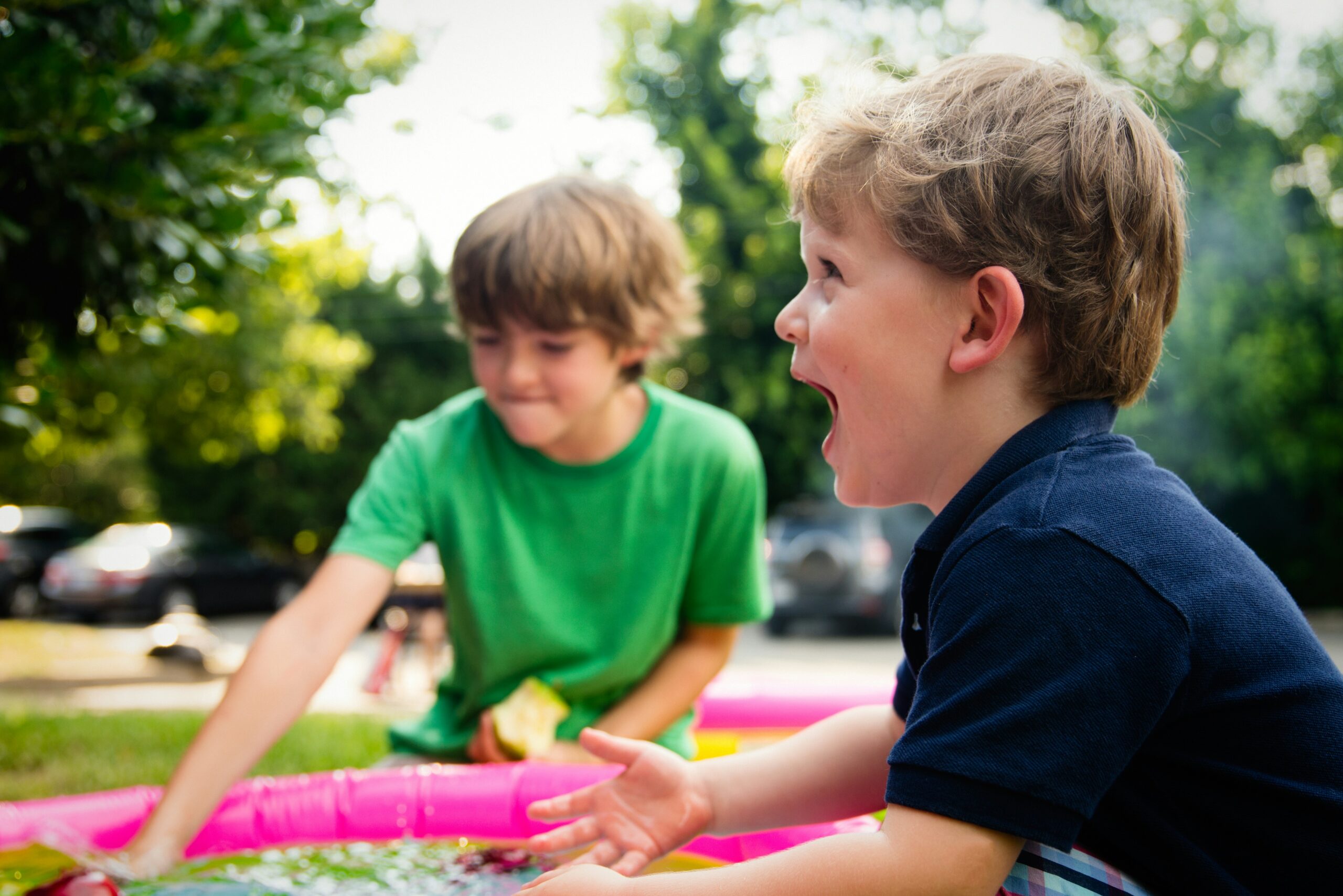 Children at speech therapy playing outside in the summer air